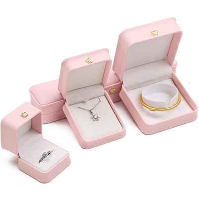 Buy 10*10*5cm Pink Leather Jewelry Box for Crown Bracelets Pendants and Rings Custom Logo online manufacture